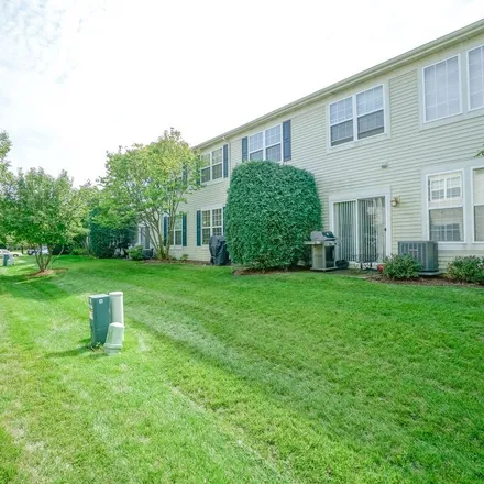 Rent this 2 bed townhouse on 559 Telluride Drive in Gilberts, Rutland Township