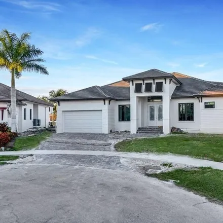 Buy this 4 bed house on Hummingbird Court in Marco Island, FL
