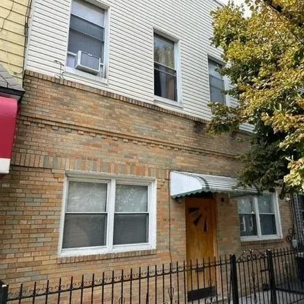 Buy this 4 bed townhouse on 488 Grandview Avenue in New York, NY 11385