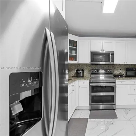 Image 4 - 17000 Northwest 67th Avenue, Miami-Dade County, FL 33015, USA - Condo for sale