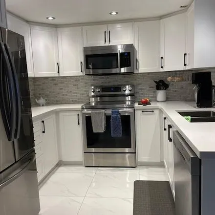 Rent this 2 bed apartment on Monarchy Condo Garden in Webb Drive, Mississauga