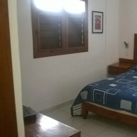 Buy this 22 bed apartment on Farmacias Especializados in Ciclovía Av. Tulum, Smz 5