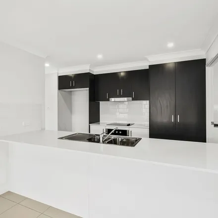 Rent this 4 bed apartment on Bergamot Circuit in Griffin QLD 4503, Australia