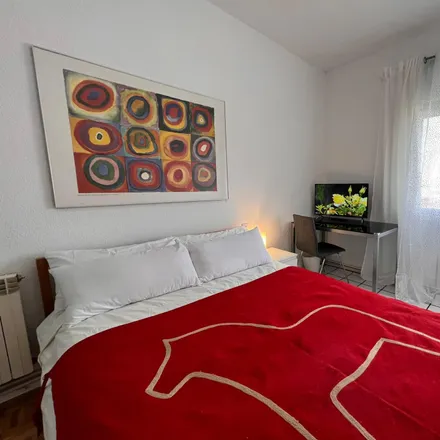 Rent this 5 bed room on Calle de Menasalbas in 8, 28041 Madrid