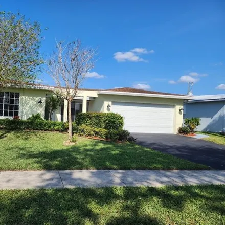 Buy this 5 bed house on 10567 Sunset Strip in Sunrise, FL 33322