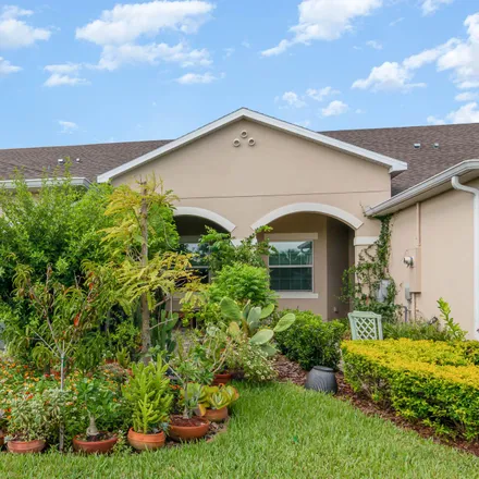 Buy this 3 bed townhouse on 2898 Lorna Drive in Melbourne, FL 32935