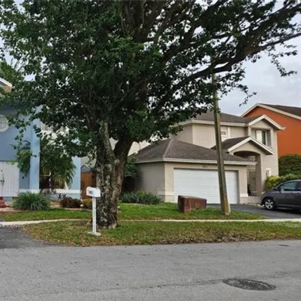 Buy this 5 bed house on Hollybrook Golf and Tennis Club in 900 Hollybrook Drive, Pembroke Pines