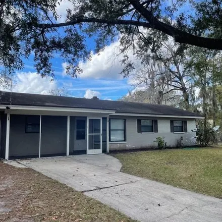 Rent this 3 bed house on 1474 Northeast 12th Street in Gainesville, FL 32601