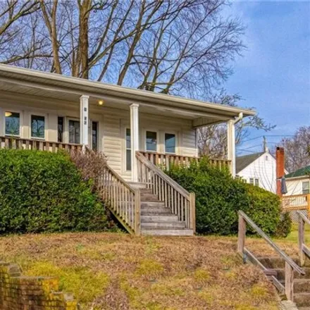 Buy this 3 bed house on 1124 Highland Avenue in Glenwood, Greensboro