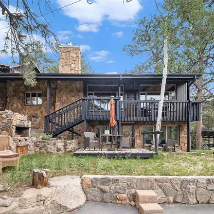 Rent this 2 bed apartment on 28666 Bear Creek Road in Evergreen, CO 80439