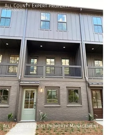 Rent this 3 bed townhouse on 1235 Cushenberry Ln in Atlanta, Georgia