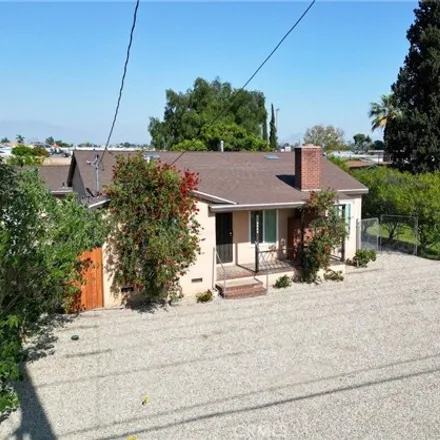 Rent this 2 bed house on Palmetto Avenue in Fontana, CA 92316