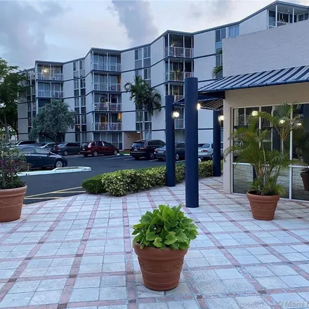 Rent this 2 bed apartment on 7075 Northwest 186th Street in Country Club, Miami-Dade County