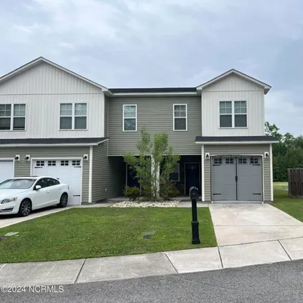 Rent this 3 bed house on 561 Carriage Drive in Country Club Hills, Jacksonville