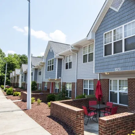 Rent this 4 bed apartment on 2020-2027 University Suites Drive in Raleigh, NC 27606