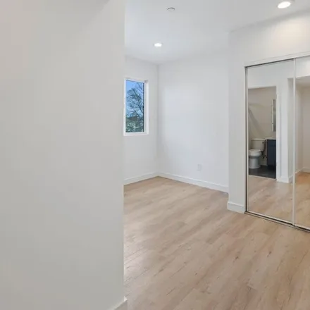 Rent this 4 bed townhouse on 1846 South Curson Avenue in Los Angeles, CA 90019