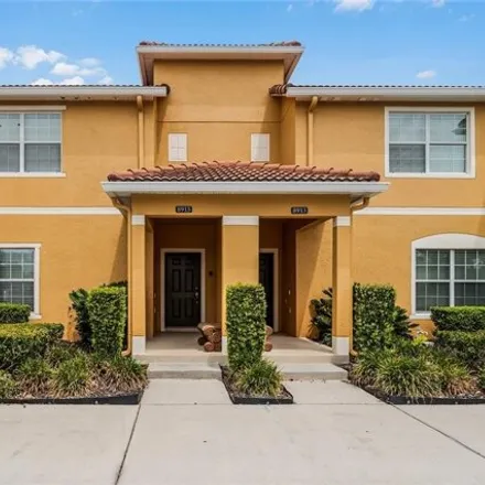 Buy this 4 bed house on 8915 Candy Palm Rd # 240 in Kissimmee, Florida