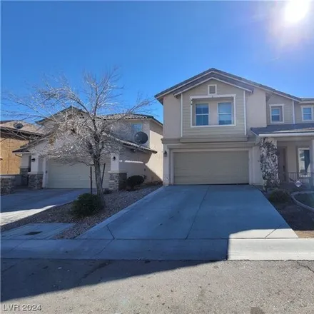 Rent this 4 bed house on 10899 Flame Vine Court in Summerlin South, NV 89135