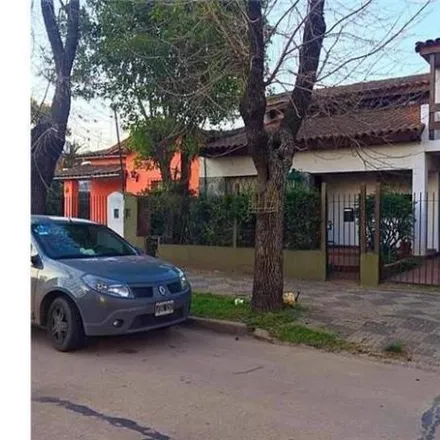 Buy this 3 bed house on Ingeniero Jorge Duclout 222 in Partido de Esteban Echeverría, 1842 Monte Grande