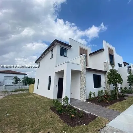 Rent this 3 bed house on Northeast 208th Terrace in Miami-Dade County, FL 33179