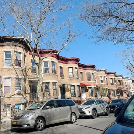 Buy this 13 bed townhouse on 617 55th Street in New York, NY 11220