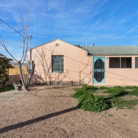 Buy this 4 bed house on 511 Los Arboles Avenue Northwest in Albuquerque, NM 87107
