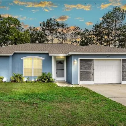 Buy this 3 bed house on 1293 Courtland Boulevard in Deltona, FL 32738