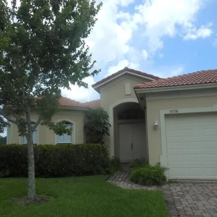 Rent this 3 bed house on 5798 Place Lake Drive in Lakewood Park, FL 34951