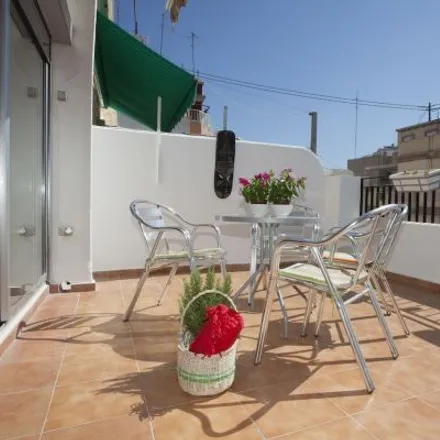 Rent this 4 bed apartment on Piko's bar in Carrer del Túria, 46008 Valencia