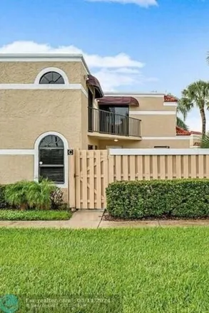 Rent this 3 bed house on 3701 Village Drive in Kingsland, Delray Beach