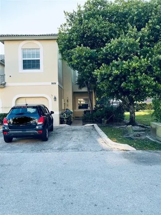 Rent this 4 bed house on 2847 Coral Hills Drive in Coral Springs, FL 33065