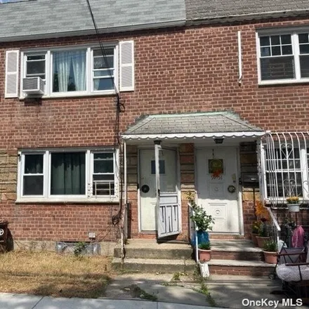 Buy this 4 bed house on 97-49 91st Street in New York, NY 11416