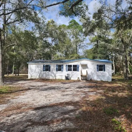Buy this studio apartment on 14031 Northwest 75 Avenue in Levy County, FL 32693