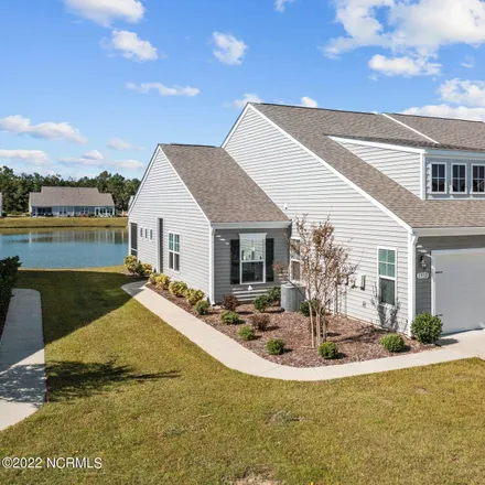 Buy this 3 bed townhouse on 1932 Coleman Lake Drive in Carolina Shores, Brunswick County