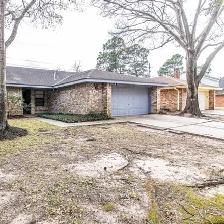 Rent this 4 bed house on 9123 Woodhouse Drive in Champion Forest, TX 77379