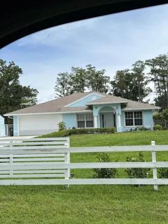 Rent this 3 bed house on 16797 66th Ct N in Loxahatchee, Florida