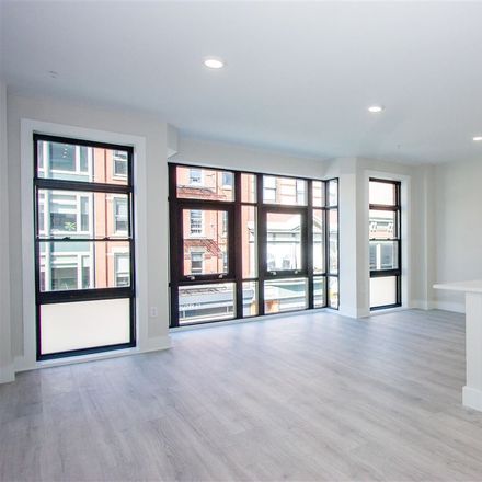 Rent this 2 bed townhouse on Newark Ave in Jersey City, NJ