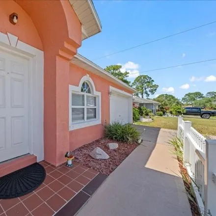 Image 3 - 1307 Ginza Road Northwest, Palm Bay, FL 32907, USA - House for sale