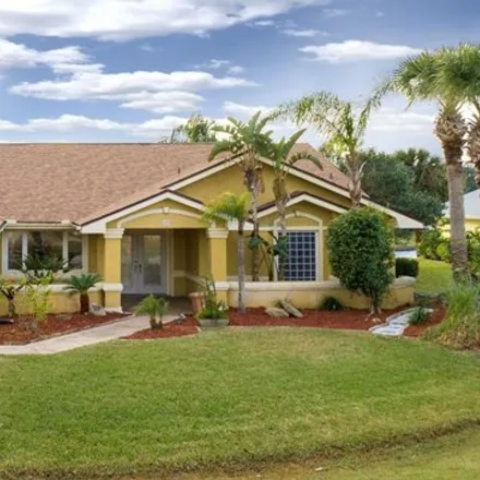 Buy this 4 bed house on 99 Cherrytree Court in Palm Coast, FL 32137