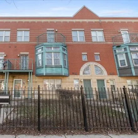 Rent this 2 bed house on 4506-4530 South Woodlawn Avenue in Chicago, IL 60637