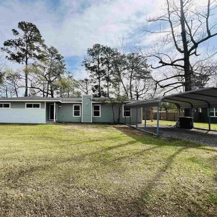 Buy this 4 bed house on 1034 Orange Street in Vidor, TX 77662