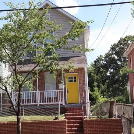 Buy this 4 bed house on 5911 Dix Street Northeast in Washington, DC 20019