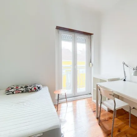 Rent this 8 bed room on Rua Carvalho Araújo 92 in 1900-936 Lisbon, Portugal