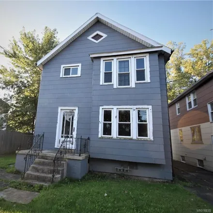 Buy this 4 bed townhouse on 65 Ladner Avenue in Buffalo, NY 14220
