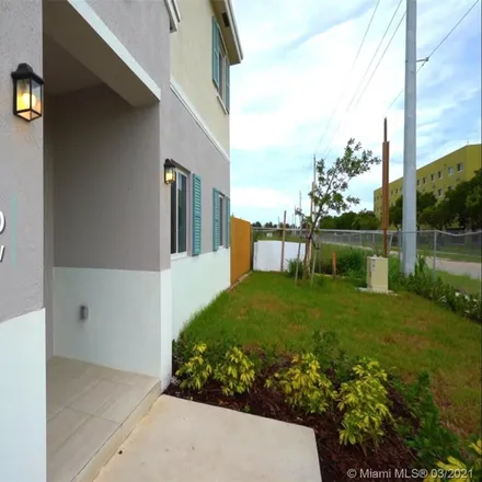Buy this 4 bed townhouse on 1246 Northwest 37th Street in Allapattah, Miami