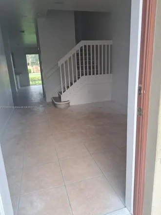 Rent this 3 bed loft on 467 Northeast 21st Terrace in Homestead, FL 33033