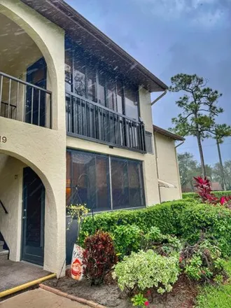 Rent this 2 bed condo on 330 Knotty Pine Circle in Greenacres, FL 33463