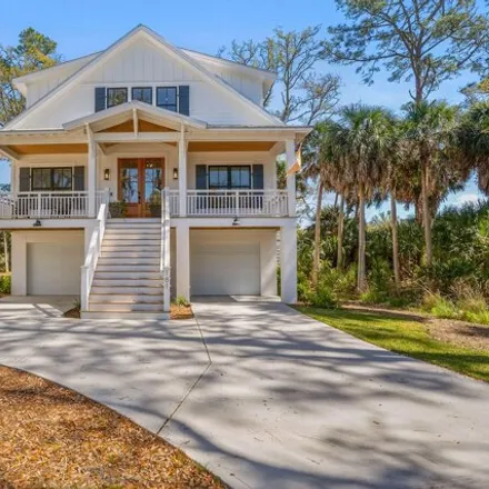 Buy this 4 bed house on Ocean Creek Golf Course in Out of Bounds Court, Fripp Island