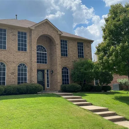Rent this 4 bed house on 1324 Prairie Drive in Lewisville, TX 75067