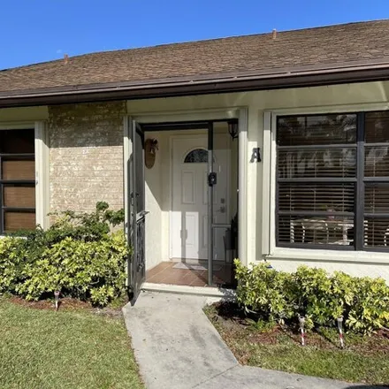 Rent this 3 bed condo on Parkside Green Drive in Greenacres, FL 33413